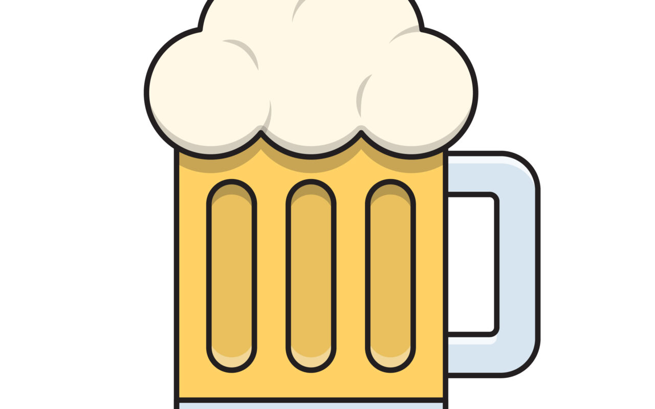 Golden beer in a frothy mug with a tall head of foam