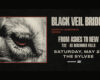 Close-up of an animal eye in a red frame on a Black Veil Brides concert poster with bold tour text on the right and a dark background.