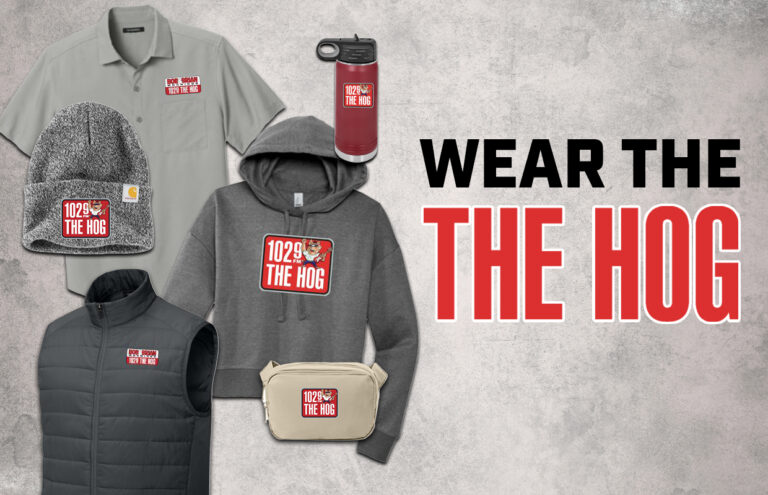 Promotional merch for 102.9 The Hog: hoodie, polo, beanie, vest, fanny pack, water bottle, all with the red station logo.