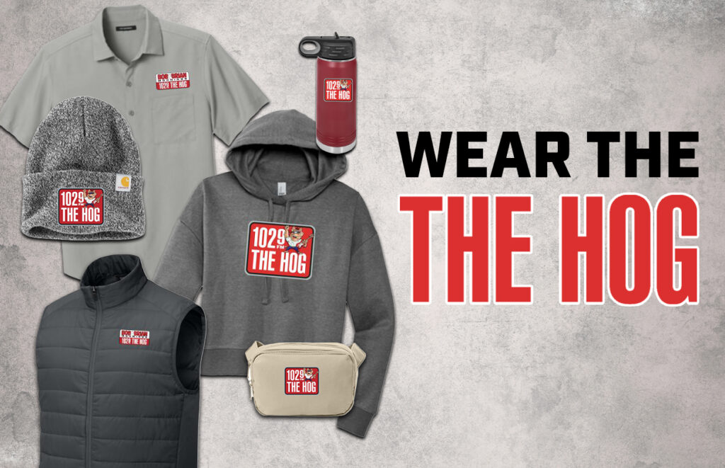 Promotional merch for 102.9 The Hog: hoodie, polo, beanie, vest, fanny pack, water bottle, all with the red station logo.
