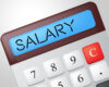 Calculator with a blue display reading SALARY!, numeric keypad visible in the foreground
