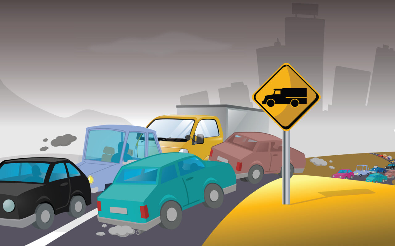Traffic jam on a highway with several cars, a yellow truck-warning sign on a post, and a city skyline in the background.