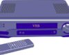 VHS player with a purple remote control placed nearby, front panel and dial visible