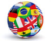 Soccer ball covered with patches of national flags, including Brazil, the United States, the United Kingdom, Spain, and Argentina in a colorful mosaic.