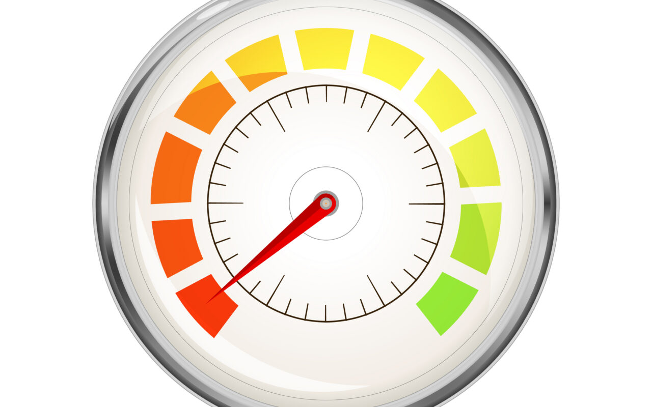 Circular gauge with a red needle pointing toward the red danger zone on a color-coded red-to-green scale