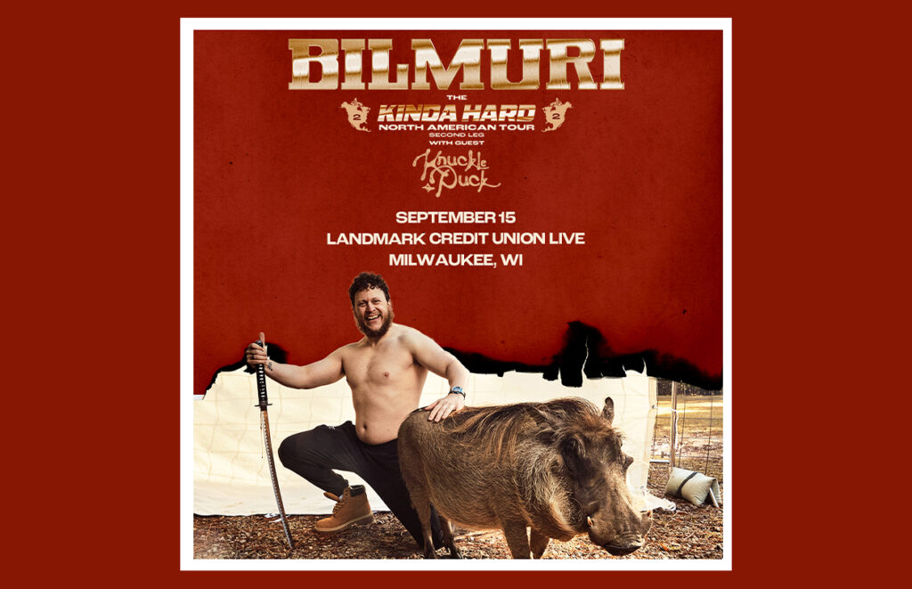 Poster for BilMuri show: shirtless man holding a sword beside a large boar on a red background with Milwaukee date details posterized text nearby.